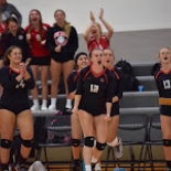 Girls Volleyball players cheering